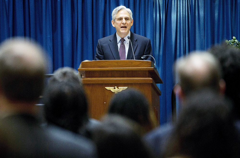 FILE - In this Thursday, April 21, 2016 file photo, Judge Merrick Garland, President Barack Obama's choice to replace the late Justice Antonin Scalia on the Supreme Court, speaks at an awards breakfast for pro bono counsel at the E. Barrett Prettyman Courthouse in Washington. In an unusual move, Garland will address the 2016 graduating class of the suburban Chicago high school he graduated from in 1970. Usually, Supreme Court nominees refrain from public speaking after they've been nominated and before confirmation hearings. (AP Photo/Pablo Martinez Monsivais)