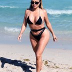 EXCLUSIVE: Larsa Pippen shows off her famous curves in a unique belted bikini that says "salty" as she hits the beach in Miami