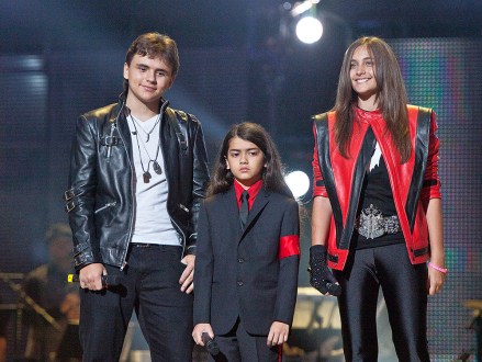 From left, Prince Jackson, Prince Michael II 'Blanket' Jackson and Paris Jackson arrive on stage at the Michael Forever the Tribute Concert, at the Millennium Stadium in Cardiff, Saturday, Oct. 8, 2011. (AP Photo/Joel Ryan) *Editorial Use Only*