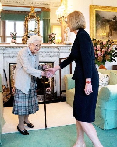 Britain's Queen Elizabeth II, left, welcomes Liz Truss during an audience at Balmoral, Scotland, where she invited the newly elected leader of the Conservative party to become Prime Minister and form a new government
Politics, Balmoral, United Kingdom - 06 Sep 2022
