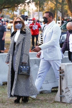 Tampa, FL  - *EXCLUSIVE*  - Jennifer Lopez and Alex Rodriguez look classy as they are seen arriving at the Super Bowl in Tampa.Pictured: Jennifer Lopez, Alex RodriguezBACKGRID USA 7 FEBRUARY 2021 BYLINE MUST READ: Maciel / BACKGRIDUSA: +1 310 798 9111 / usasales@backgrid.comUK: +44 208 344 2007 / uksales@backgrid.com*UK Clients - Pictures Containing ChildrenPlease Pixelate Face Prior To Publication*
