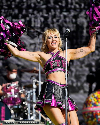 Miley Cyrus performs before the Kansas City Chiefs play the Tampa Bay Buccaneers in Super Bowl LV, Sunday. Feb. 7, 2021, in Tampa, Fla. (AP Photo/Doug Benc)
