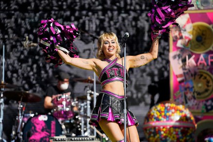 Miley Cyrus performs before the Kansas City Chiefs play the Tampa Bay Buccaneers in Super Bowl LV, Sunday. Feb. 7, 2021, in Tampa, Fla. (AP Photo/Doug Benc)