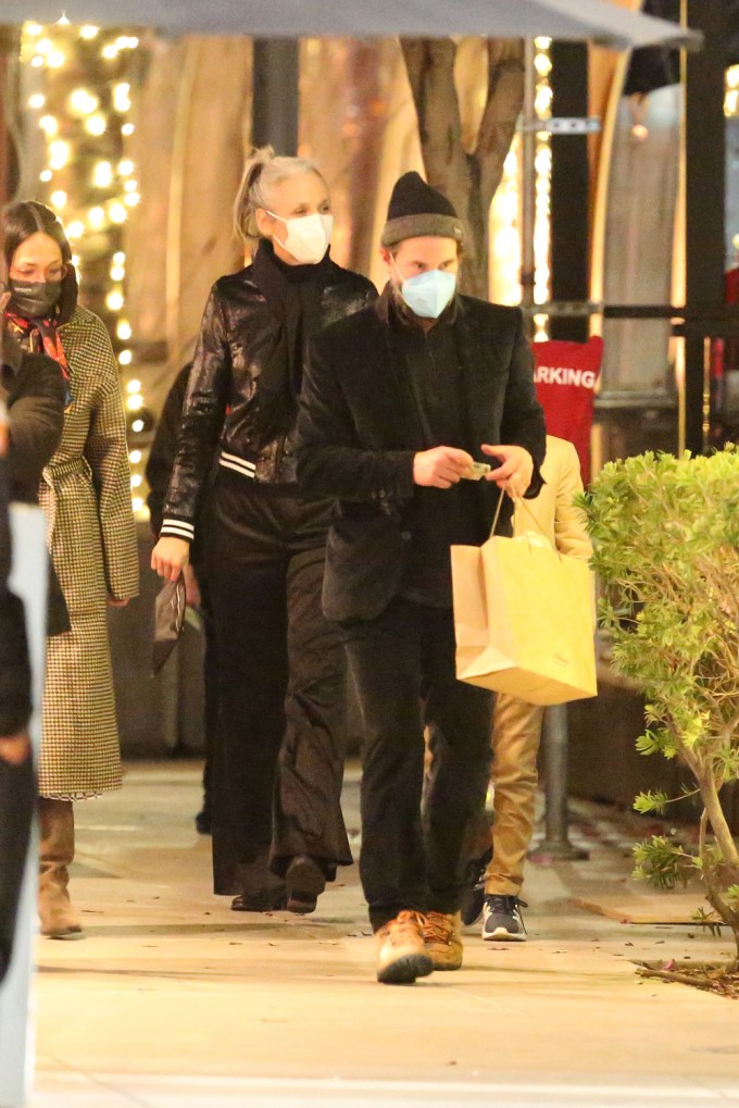 Keanu Reeves and Alexandra Grant leaving a restaurant