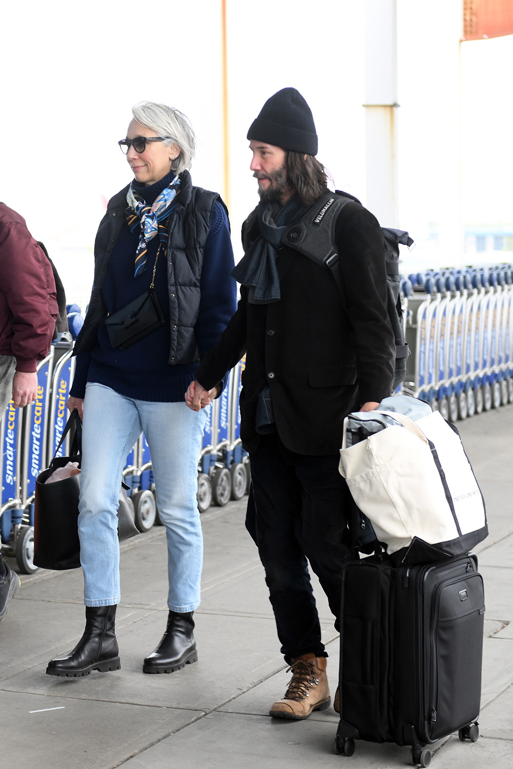 Keanu Reeves And His Girlfriend Alexandra Grant Holding Hands While Arriving At JFK International Airport In New York City