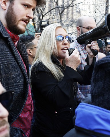 U.S. Representitive Margorie Taylor Green is mobbed by media when she speaks as Trump Supporters and protesters gather outside of New York Criminal Court at 100 Centre Street awaiting the arrival and the arraignment of Former President Donald Trump after a grand jury indictment in New York City on Tuesday, April 4, 2023. Donald Trump was indicted Thursday by a Manhattan grand jury on more than 30 counts related to business fraud. Manhattan District Attorney Alvin Bragg has been investigating the former president in connection with his alleged role in a hush money payment scheme and cover-up involving adult film star Stormy Daniels.
Grand Jury Indictment of Former President Donald Trump, New York, United States - 04 Apr 2023