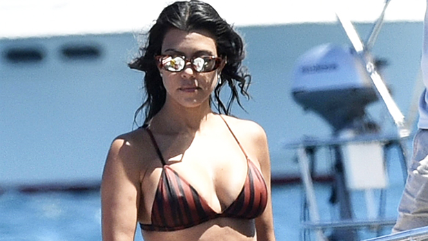 Kim and Kourtney Kardashian's Skims blue swimsuits  Kim and kourtney,  Kourtney kardashian, Blue swimsuit