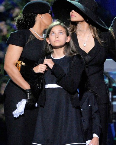 Janet Jackson, Paris Jackson, La Toya Jackson, Randy Jackson, Prince Michael I. Janet Jackson, left, and sister LaToya Jackson, stand behind Michael Jackson's daughter Paris Jackson on stage during the memorial service for Michael Jackson at the Staples Center in Los Angeles
Michael Jackson, Los Angeles, USA - 7 Jul 2009