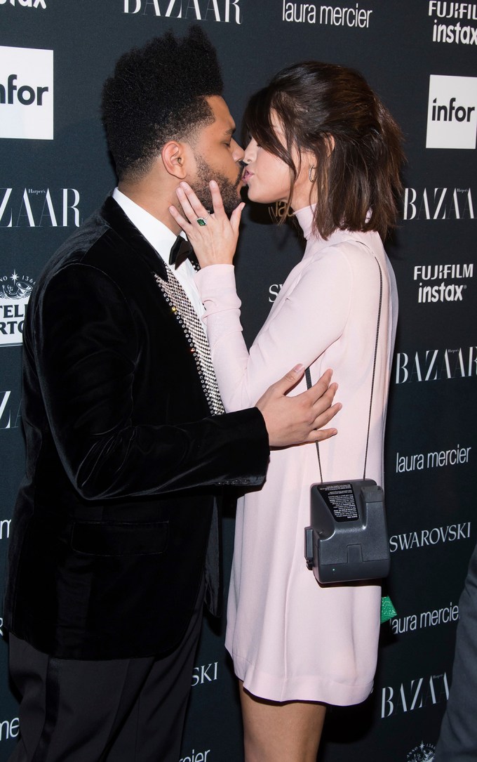 Selena Gomez & The Weeknd Share A Kiss