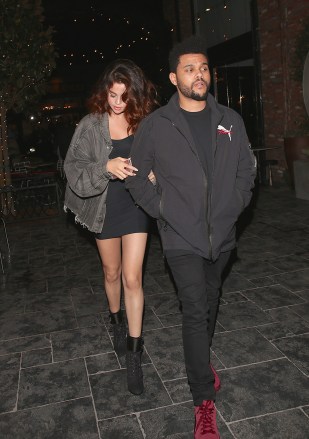 EXCLUSIVE: Selena Gomez and the Weeknd have a night on the town. 06 Apr 2017 Pictured: Selena Gomez and the weekend have a night on the town. Photo credit: MEGA TheMegaAgency.com +1 888 505 6342 (Mega Agency TagID: MEGA28504_017.jpg) [Photo via Mega Agency]