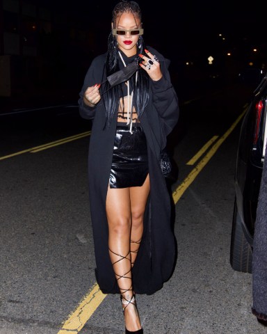 Rihanna Shows Off her Legs in Tiny Black Skirt as She Heads to Dinner at Giorgio Baldi. She flashed her toned abs and long legs in a match black top and bottom, with strappy heels and a long black coat on a warm evening in LA.Pictured: RihannaRef: SPL5218733 290321 NON-EXCLUSIVEPicture by: DIGGZY / SplashNews.comSplash News and PicturesUSA: +1 310-525-5808London: +44 (0)20 8126 1009Berlin: +49 175 3764 166photodesk@splashnews.comWorld Rights, No Portugal Rights, No Russia Rights