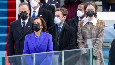  Doug Emhoff (from left), Vice President Elect Kamala Harris, Cole Emhoff,  Ella Emhoff, and Vice President Mike Pence stand as Lady Gaga sings the National Anthem at the inauguration of U.S. President-elect Joe Biden on the West Front of the U.S. Capitol on January 20, 2021 in Washington, DC.  During today's inauguration ceremony Joe Biden becomes the 46th president of the United States. (Photo by Win McNamee/Getty Images)