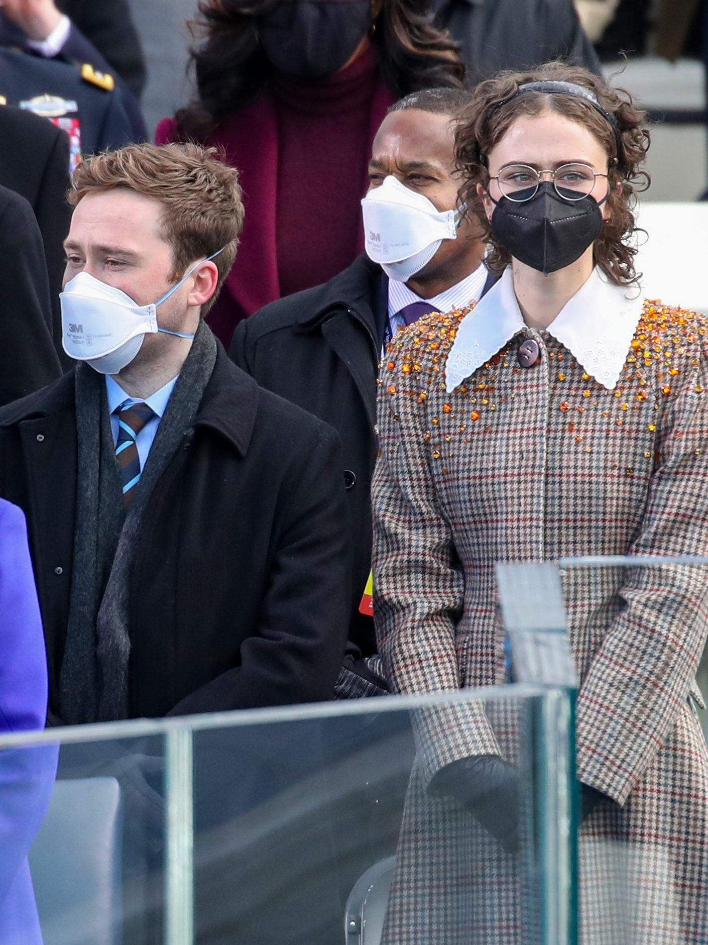 WASHINGTON, DC - JANUARY 20: Doug Emhoff (from left), Vice President Elect Kamala Harris, Cole Emhoff,  Ella Emhoff, and Vice President Mike Pence stand as Lady Gaga sings the National Anthem at the inauguration of U.S. President-elect Joe Biden on the West Front of the U.S. Capitol on January 20, 2021 in Washington, DC.  During today's inauguration ceremony Joe Biden becomes the 46th president of the United States. (Photo by Win McNamee/Getty Images)