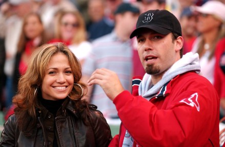 Us Actors Jennifer Lopez (l) and Ben Affleck (r) Watch the Pre-game Ceremony Before the Start of Game 3 of the American League Championship Series Between the Boston Red Sox and New York Yankees October 11, 2003 at Fenway Park in Boston Ma the Best-of-seven Series is Tied 1-1 Usa Baseball Alcs - Oct 2003