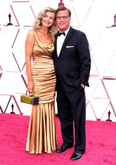 Pool Photo
Mandatory Credit: Photo by Chris Pizzello/Pool/Shutterstock (11868956st)
Paulina Porizkova, left, and Aaron Sorkin arrive at the Oscars
93rd Annual Academy Awards, Arrivals, Los Angeles, USA - 25 Apr 2021