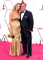 Pool Photo
Mandatory Credit: Photo by Chris Pizzello/Pool/Shutterstock (11868956st)
Paulina Porizkova, left, and Aaron Sorkin arrive at the Oscars
93rd Annual Academy Awards, Arrivals, Los Angeles, USA - 25 Apr 2021