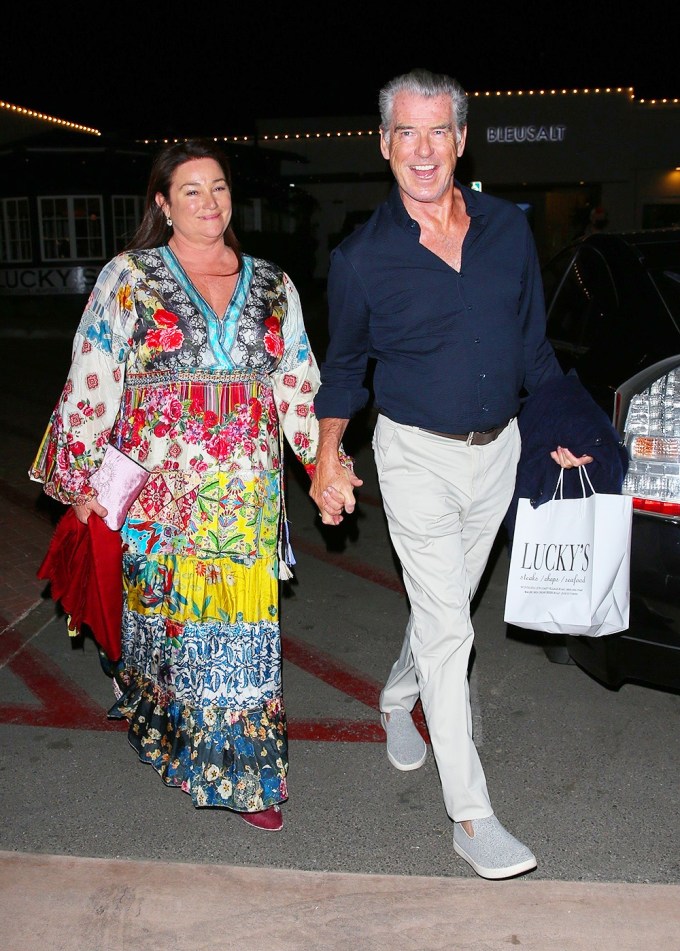 Pierce Brosnan & Wife Keely Smith hold hands
