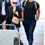*EXCLUSIVE* 'Bridgerton' actor Rege-Jean Page looks suave while with girlfriend Emily Brown leaving the Venice Airport!