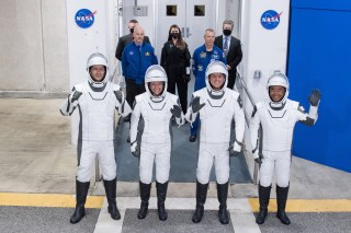 From left to right, ESA (European Space Agency) astronaut Thomas Pesquet, NASA astronauts Megan McArthur and Shane Kimbrough, and Japan Aerospace Exploration Agency (JAXA) astronaut Akihiko Hoshide, wearing SpaceX spacesuits, are seen as they prepare to depart the Neil  A. Armstrong Operations and Checkout Building for Launch Complex 39A to board the SpaceX Crew Dragon spacecraft for the Crew-2 mission launch, on Friday, April 23, 2021, at NASA's Kennedy Space Center in Florida. NASA's SpaceX Crew-2 mission is the second crew rotation mission of the SpaceX Crew Dragon spacecraft and Falcon 9 rocket to the International Space Station as part of the agency's Commercial Crew Program. Kimbrough, McArthur, Pesquet, and Hoshide are scheduled to launch at 5:49 a.m. EDT.
NASA crew-2 walks out for launch from the Kennedy Space Center, Florida, USA - 23 Apr 2021
