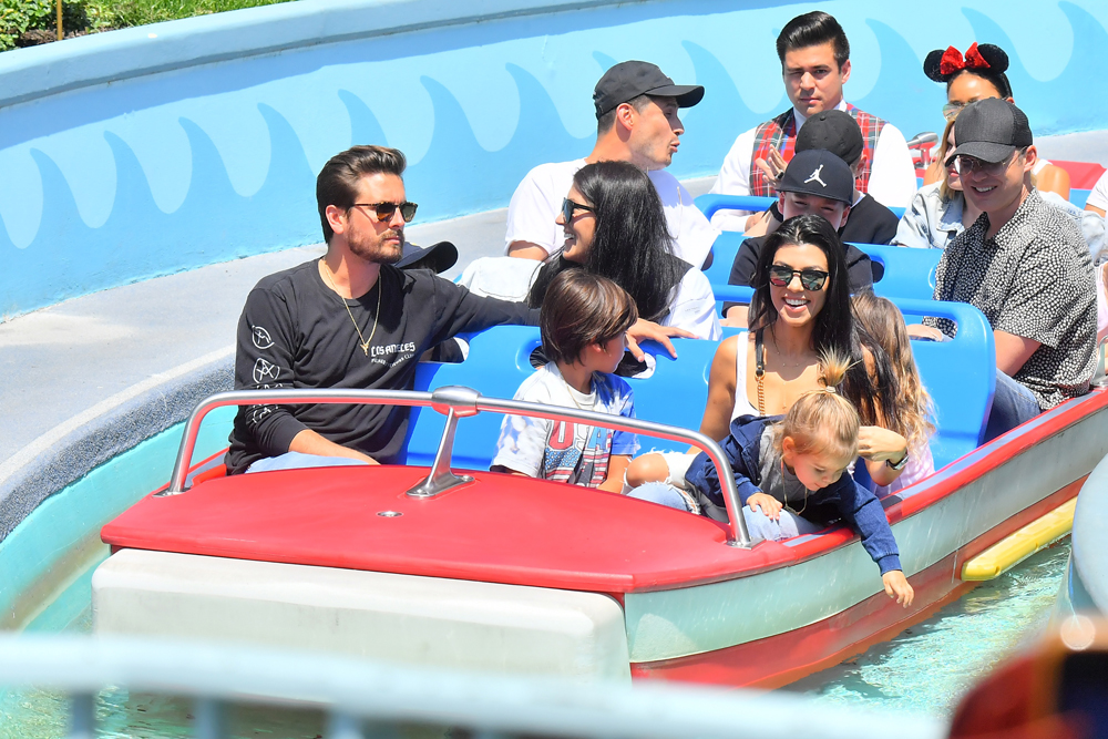 Kourtney Kardashian celebrated her birthday with Scott Disick and her kids at Disneyland. Kourtney also brought her neice North West along, whohad a great time on the carousel. The family were seen enjoying several rides including 'It's A Small World' 'Thunder Mountain' 'Dumbo' and 'Mr Toad's Wild Adventure'. The group brought along a couple of their own bodyguards and were joined by Disneylands head of security. 18 Apr 2017 Pictured: Kourtney Kardashian, Scott Disick, Mason Disick, Penelope Disick, Reign Disick, North West. Photo credit: Snorlax / MEGA TheMegaAgency.com +1 888 505 6342 (Mega Agency TagID: MEGA30260_003.jpg) [Photo via Mega Agency]