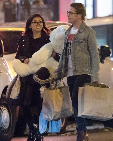 *EXCLUSIVE* ** RIGHTS: ONLY UNITED STATES, CANADA ** Paris, FRANCE  - Former child star, Macaulay Culkin and actress Brenda Song were photographed in Paris during  Thanksgiving holiday weekend. Macaulay and Brenda were spotted out shopping at Monoprix retail store, Macaulay gifted his girlfriend a giant Teddy Bear. SHOT ON 11/21  Pictured: Macaulay Culkin and Brenda Song  BACKGRID USA 28 NOVEMBER 2017   BYLINE MUST READ: Best Image / BACKGRID  USA: +1 310 798 9111 / usasales@backgrid.com  UK: +44 208 344 2007 / uksales@backgrid.com  *UK Clients - Pictures Containing Children Please Pixelate Face Prior To Publication*