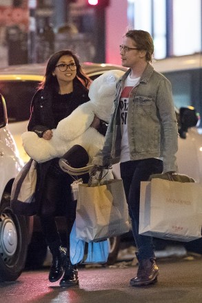 *EXCLUSIVE* ** RIGHTS: USA & CANADA ONLY ** PARIS, FRANCE - Former child star Macaulay Culkin and actress Brenda Song were filmed in Paris over the Thanksgiving holiday weekend. Macaulay and Brenda were spotted shopping at a Monoprix retail store and Macaulay presented his girlfriend with a giant teddy bear. Taken on 11/21 Photo: Macaulay Culkin and Brenda Song.com * UK Client - Photos containing children must have their faces pixelated before publishing*