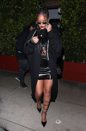 Singer, Rihanna seen wearing a short black mini skirt as she leaves dinner at Giorgio Baldi Restaurant in Santa Monica, CA. 28 Mar 2021 Pictured: Rihanna. Photo credit: MEGA TheMegaAgency.com +1 888 505 6342 (Mega Agency TagID: MEGA742951_011.jpg) [Photo via Mega Agency]