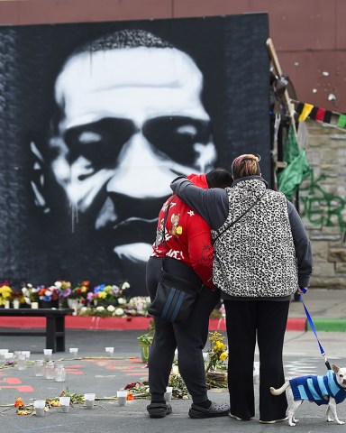 A couple pause for a moment in front of a portrait of George Floyd on the second day of deliberations for the murder trial of former Minneapolis police officer Derek Chauvin who was charged in the death of George Floyd are being held, in Minneapolis, Minnesota, USA, 20 April 2021.
Derek Chauvin Trial, Minneapolis, USA - 20 Apr 2021