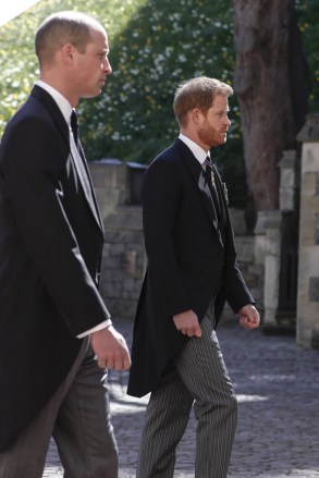 Prince William, left, and Prince Harry follow the coffin in a ceremonial procession for the funeral of Britain's Prince Philip inside Windsor Castle in Windsor, England . Prince Philip died April 9 at the age of 99 after 73 years of marriage to Britain's Queen Elizabeth II
Prince Philip Funeral, Windsor, United Kingdom - 17 Apr 2021