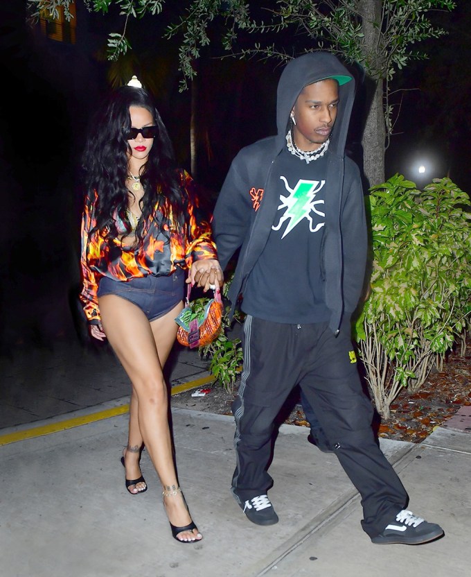 Rihanna and A $AP Rocky go hand in hand during Miami date night. 