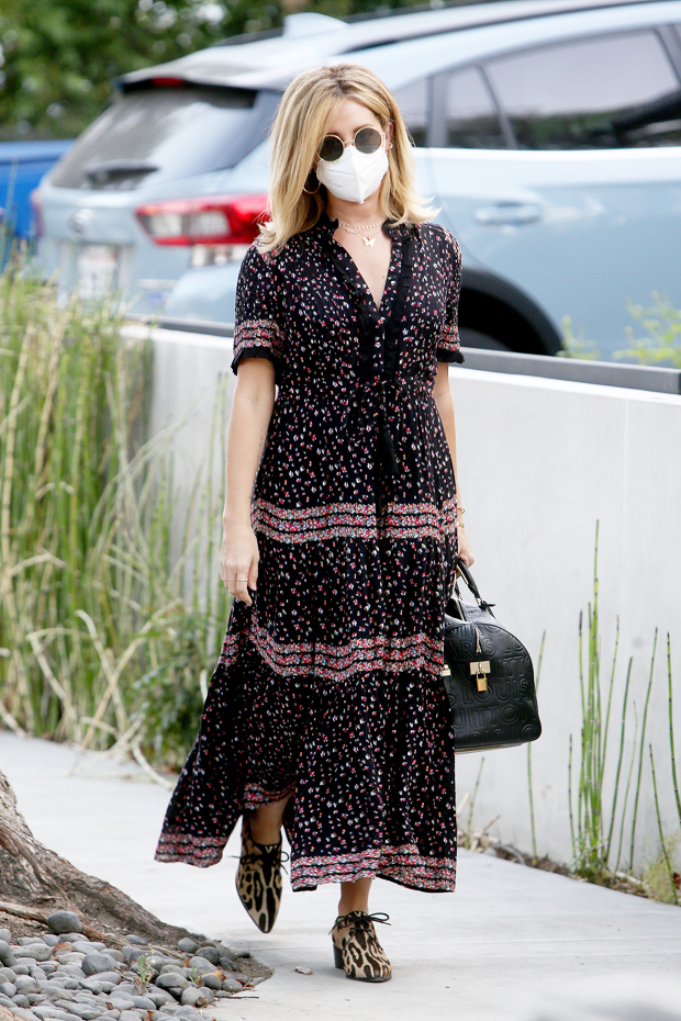 Ashley Tisdale wearing a flowy maxi dress