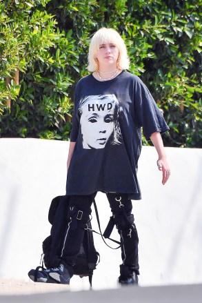EXCLUSIVE: Billie Eilish shows off her new haircut inspired by her mom's hair as she says she is 'Happier than Ever.' Billie was seen leaving a studio with her brother Finneas in Santa Monica. The pair were seen leaving after shooting a new music video for their new album 'Happier than ever', Billie wore an oversized shirt and was seen rocking her new short hair that she claims was inspired by her mom. 24 Aug 2021 Pictured: Billie Eilish and Finneas O'Connell. Photo credit: Tom Nook/MEGA TheMegaAgency.com +1 888 505 6342 (Mega Agency TagID: MEGA781051_036.jpg) [Photo via Mega Agency]