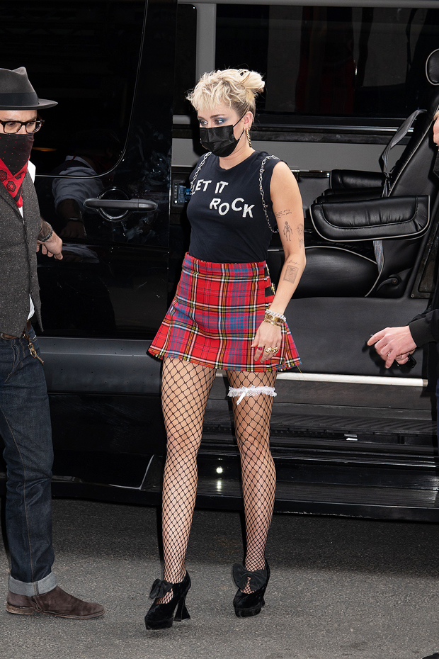 Miley Cyrus Rocks A Tartan Mini Skirt Fishnets Garter At