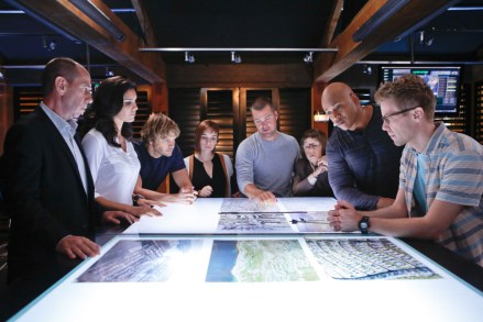 The NCIS: LA team at the OPS Center discussing the incident. Photo: Miguel Ferrer (NCIS Assistant Director Owen Granger).Daniella Luhr (Special Agent Kensi Bly), Eric Christian Olsen (LAPD Liaison Marty Deeks), Renne Ferris Smith (Intelligence Analyst Nell Jones), Eric Christian Olsen (LAPD Liaison Marty Deeks), Chris O'Donnell (Special Agent G. Cullen), Linda Hunt (Henrietta "Hetty" Lange), LL COOL J (Special Agent Sam Hanna) and Barrett Foa (Tech Operator Eric Beale).  NCIS: LOS ANGELES airs Tuesdays (9:00 pm - 10:00 pm, ET/PT) on the CBS television network. Photo: Cliff Lipson/CBS ©2013 CBS Broadcasting, Inc. All rights reserved.
