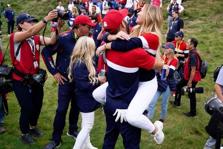 Team USA's Dustin Johnson celebrates with Paulina Gretzky after the Ryder Cup matches at the Whistling Straits Golf Course, in Sheboygan, Wis
Ryder Cup Golf, Sheboygan, United States - 26 Sep 2021