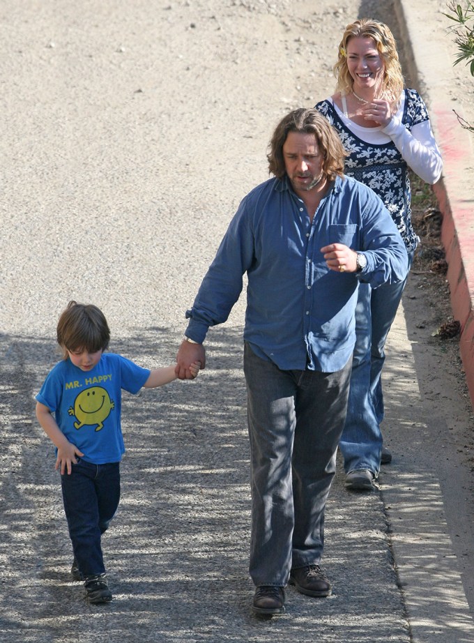 Russell Crowe Holds His Son’s Hand