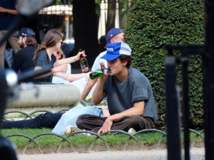 EXCLUSIVE: Jack Depp seen in Paris enjoying the sun in the Place des Vosges garden reading while drinking a beer. 09 May 2021 Pictured: Jack Depp. Photo credit: Love Paris / MEGA TheMegaAgency.com +1 888 505 6342 (Mega Agency TagID: MEGA754618_010.jpg) [Photo via Mega Agency]