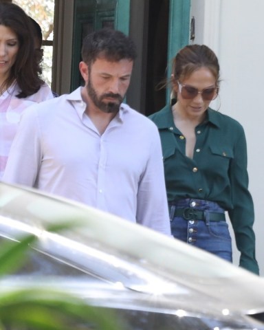 Los Angeles, CA  - Ben Affleck and Jennifer Lopez were seen getting a jump on their Saturday checking out a spectacular $68m mansion. The home seems to be in keeping with others the couple has been looking at but this one seems to have more of a modern appeal with 12 bedrooms and a whopping 24 bathrooms. The couple was spotted together with a realtor and Jlo’s sister Linda checking out the modern mansion for an hour.  Pictured: Ben Affleck, Jennifer Lopez  BACKGRID USA 7 MAY 2022   BYLINE MUST READ: Vasquez-Max Lopes / BACKGRID  USA: +1 310 798 9111 / usasales@backgrid.com  UK: +44 208 344 2007 / uksales@backgrid.com  *UK Clients - Pictures Containing Children Please Pixelate Face Prior To Publication*