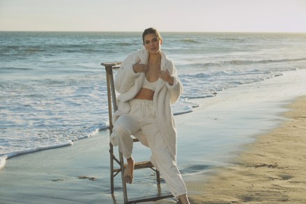 Kendall Jenner poses by the ocean as she stars in Alo’s first ever Holiday Jackets and Coats campaign for Fall 2021. Alo - which stands for Air, Land and Ocean - says the collection is meant to be worn from coast to coast, with jackets and coats for every climate. The collection will drop throughout the holiday season, launching with the Stunner Puffer. Kendall has been a longstanding ambassador for the celebrity-favourite athletic brand, which also includes menswear, yoga gear and a beauty line focused on getting the ultimate glow. She says in a video for the campaign: “I actually remember the first time I went to Alo, must have been six or seven years ago. I feel like it was right when they popped up. “And I just loved it. I think there stuff is amazing, and so I’ve been on to Alo for a minute now.” *BYLINE: Alo/Mega. 05 Oct 2021 Pictured: Kendall Jenner stars in Alo’s Holiday Jackets and Coats campaign for Fall 2021. *BYLINE: Alo/Mega. Photo credit: Alo/MEGA TheMegaAgency.com +1 888 505 6342 (Mega Agency TagID: MEGA793828_003.jpg) [Photo via Mega Agency]