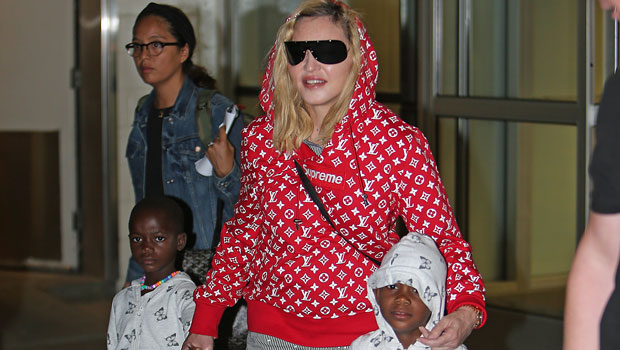 Make-up free Madonna sports Supreme hoodie with family at JFK