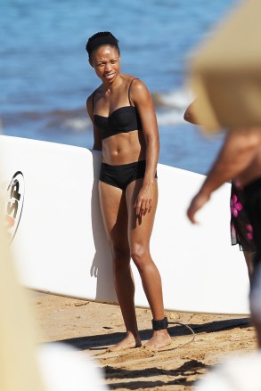 US 200m Olympic Champion Allyson Felix in a bikini on the beach in Hawaii. The smoking hot athlete was all smiles as  she took some time to Stand Up Paddle Boarding with Kenneth Ferguson in front of the Four Seasons Maui.Pictured: Allyson Felix,Allyson FelixKenneth FergusonRef: SPL470733 151212 NON-EXCLUSIVEPicture by: SplashNews.comSplash News and PicturesUSA: +1 310-525-5808London: +44 (0)20 8126 1009Berlin: +49 175 3764 166photodesk@splashnews.comWorld Rights