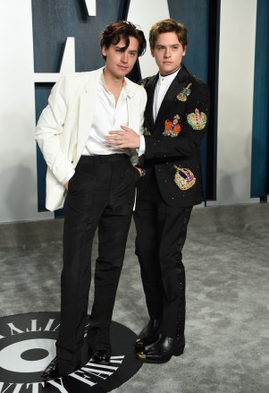 Cole Sprouse, Dylan Sprouse. Cole Sprouse, left, and Dylan Sprouse arrive at the Vanity Fair Oscar Party, in Beverly Hills, Calif
92nd Academy Awards - Vanity Fair Oscar Party, Beverly Hills, USA - 09 Feb 2020