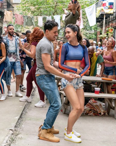 IN THE HEIGHTS, foreground from left: Anthony Ramos, Melissa Barrera, 2020.  ph: Macall Polay / © Warner Bros. / Courtesy Everett Collection