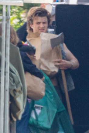 Atlanta, GA  - *EXCLUSIVE*  - The Cast of 'Stranger Things' prepares for War as the main cast plus 3 new members get into character to film the next season while on location, in Atlanta and from the look of it, things are about to get real! A shirtless Joe Kerry was seen bruised as they prepared to film a battle scene with Natalia Dyer holding a shotgun. Sadie Sink, Maya Hawk and new cast members are scene in these new images! *Shot on June 14, 2021*Pictured: Joe KeeryBACKGRID USA 15 JUNE 2021 USA: +1 310 798 9111 / usasales@backgrid.comUK: +44 208 344 2007 / uksales@backgrid.com*UK Clients - Pictures Containing ChildrenPlease Pixelate Face Prior To Publication*