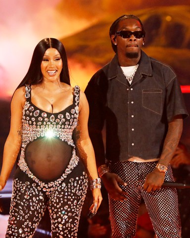 LOS ANGELES, CALIFORNIA - JUNE 27: (L-R) Cardi B and Offset of Migos perform onstage at the BET Awards 2021 at Microsoft Theater on June 27, 2021 in Los Angeles, California. (Photo by Johnny Nunez/Getty Images for BET)