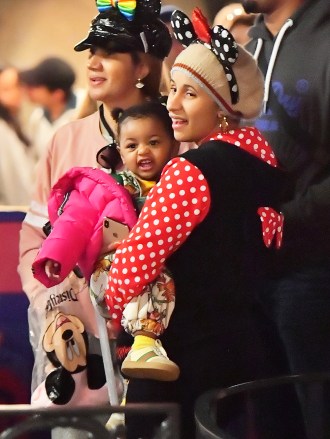 EXCLUSIVE: Cardi B looks incredibly happy with her daughter Kulture as the spend an evening at Disneyland. Cardi, Who was joined by a couple of friends and bodyguards, was seen having a blast riding the rides in Fantasyland including the Alive in wonderland, she and kulture took selfies on dumbo, and was seen going for a ride on the carousel. the pair were seen enjoying cotton candy before heading to the Pirates of the Caribbean ride. Cardi was seen arriving. little late at the park, around 8 pm, just in time to enjoy the fireworks and then headed in to enjoy the rides at the time most people are seen leaving the theme park. 02 Nov 2019 Pictured: Cardi B, Kulture Kiari Cephus. Photo credit: Marksman / MEGA TheMegaAgency.com +1 888 505 6342 (Mega Agency TagID: MEGA540687_011.jpg) [Photo via Mega Agency]