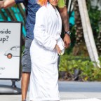A Makeup Free Cardi B Is Seen Out Shopping In Miami While Wearing A White Bathrobe