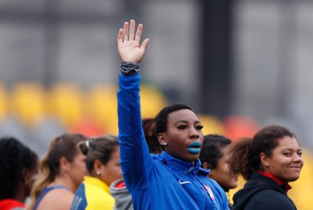 Gwendolyn "Gwen" Berry of the United States waves as she is introduced at the start of the women's hammer throw final, during athletics competition at the Pan American Games in Lima, Peru. Berry won the gold medal. The U.S. Olympic and Paralympic Committee is signaling willingness to challenge longstanding IOC rules restricting protests at the Olympics, while also facing backlash from some of its own athletes for moves viewed by some as not being driven by sufficient athlete input
USOPC Protest Problems, Lima, Peru - 10 Aug 2019