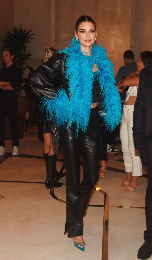 Kendall Jenner At Resorts World Vegas: Wears Leather Pants & Boa