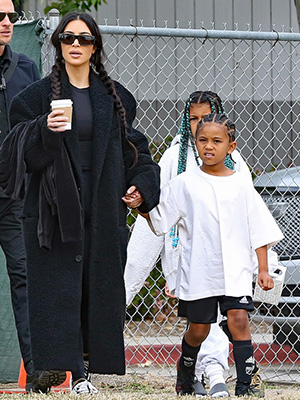 Kim Kardashian shows off her MASSIVE color-coded shoe and